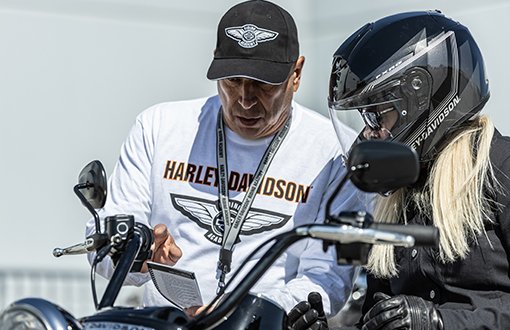 Motorcycle coach with student